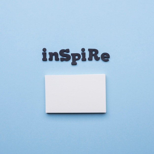 Free photo minimalist empty business card and inspire word