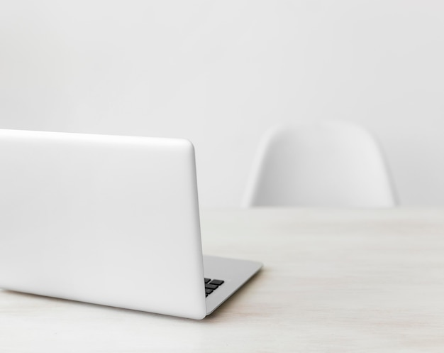 Minimalist office laptop and chair