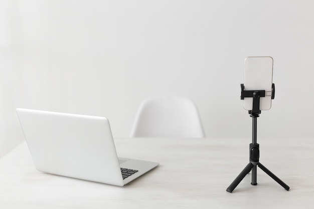 Minimalist office laptop and mobile phone