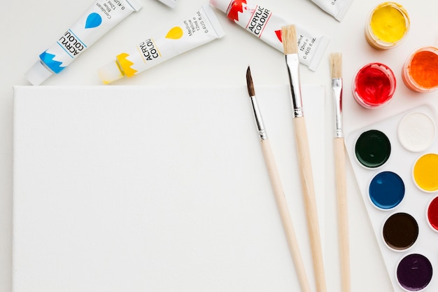 Minimalist paint and brushes copy space