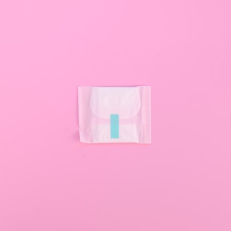 Minimalist wrapped pad on pink background