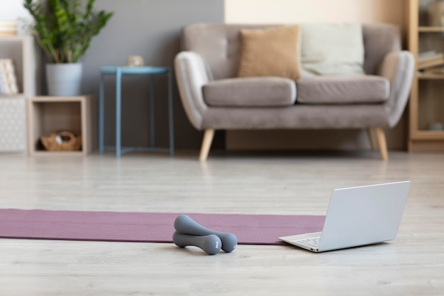 Minimalistic interior design with yoga mat on the floor