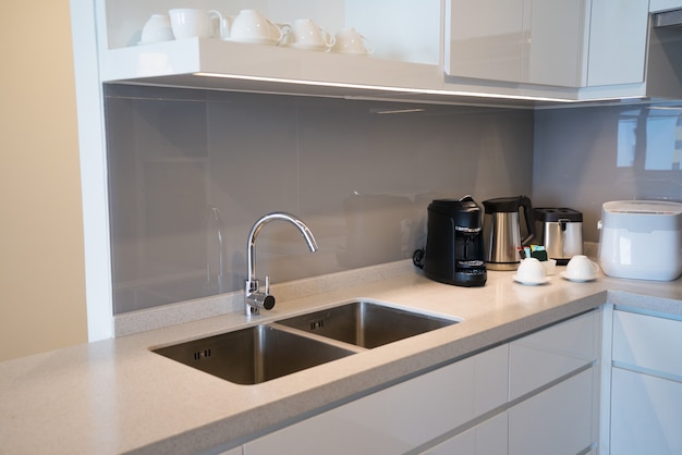 Minimalistic kitchen corner with appliances. 