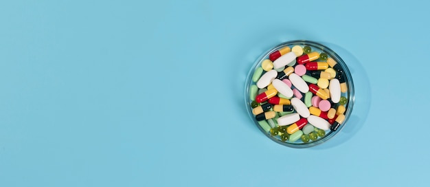 Free photo minimalistic science banner with pills