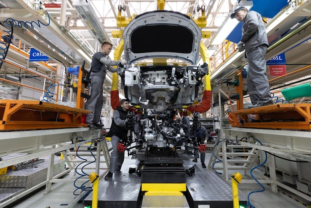 Minsk Belarus Dec 15 2021 Automobile production line Welding car body Modern car assembly plant Auto industry Interior of a hightech factory modern production