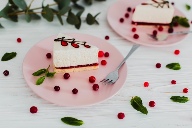 Free photo mint and berries near piece of cake