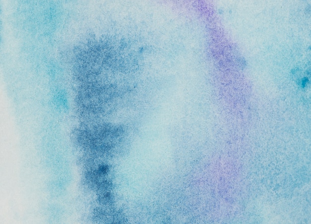 Mix of blue and violet watercolor on paper