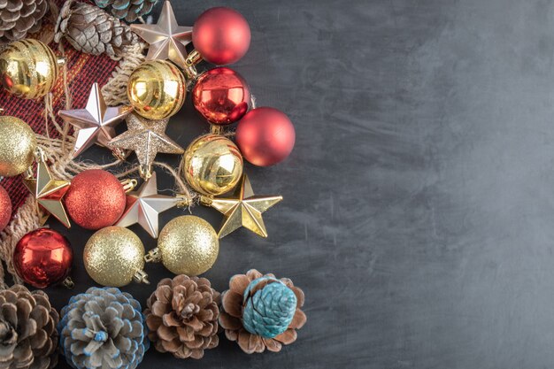 Mix of colorful oak tree ornaments on a dark