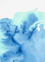Бесплатное фото Смешанная синяя акварель текстурированный фон