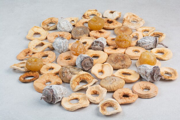 Mixed healthy dried fruits on white background. High quality photo