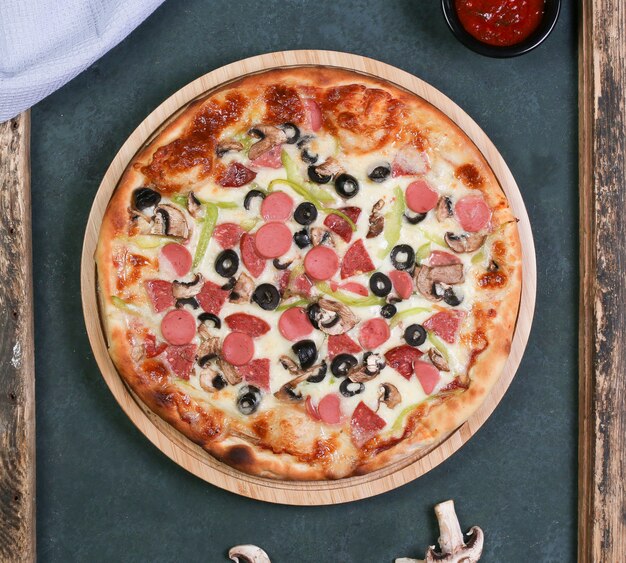 Mixed ingredient pizza with black olives.