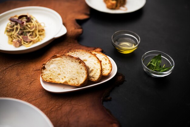 Mixed italian food plates on table