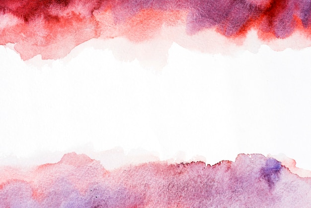 Free photo mixed red and purple watercolor brush splash on white background