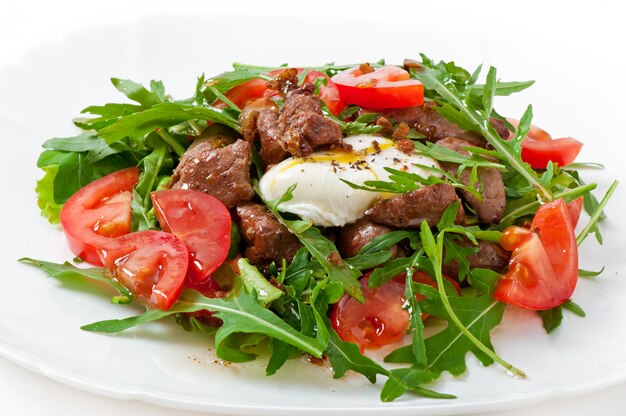 Mixed salad with chicken liver and egg Pochet