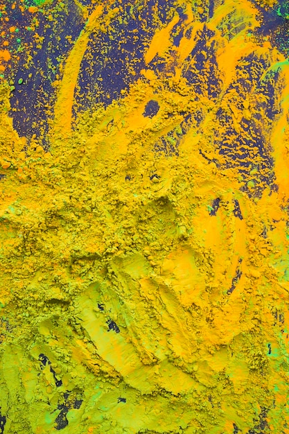 Mixed yellow and green holi powder