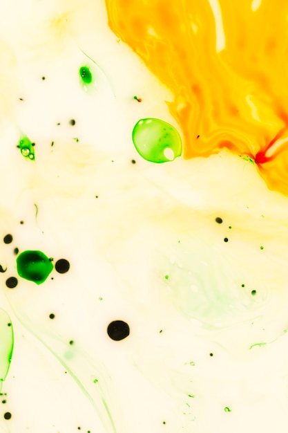 Free photo mixture of coloured stains abstract in oil