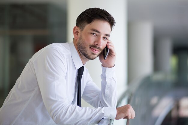 Mobile man connecting with business partner