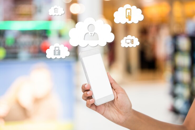 Free Photo mobile phone and clouds with application icons