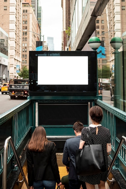 Free photo mock-up billboard over metro entrance