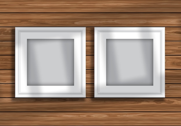  mock up display with blank picture frames on wooden texture