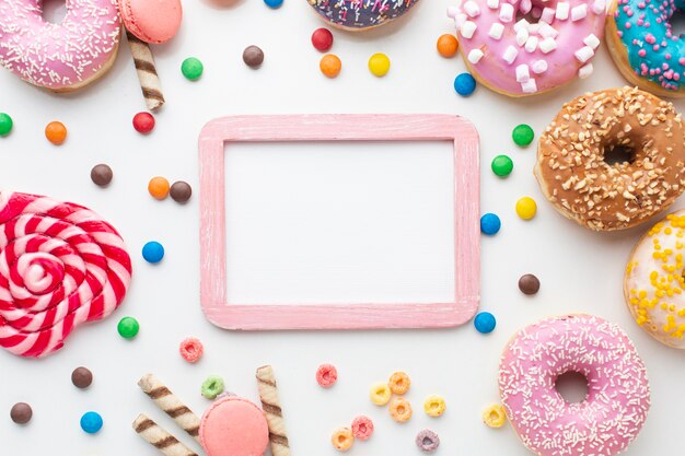 Mock-up frame surrounded by sweets