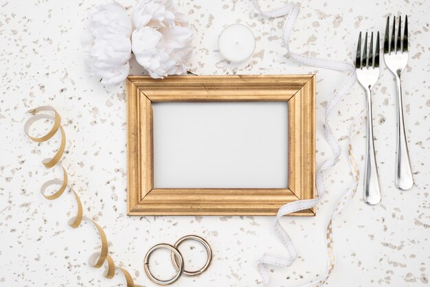 Mock-up frame with wedding rings