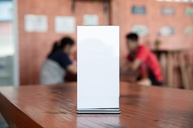 Mock up Menu frame on Table in Bar restaurant-cafeteria