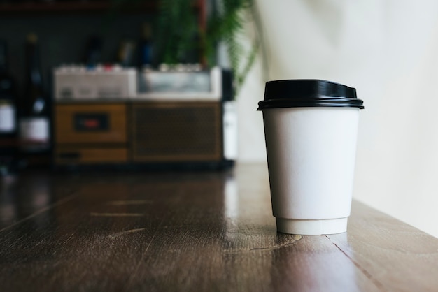 Free photo mockup of a disposable cup of coffee