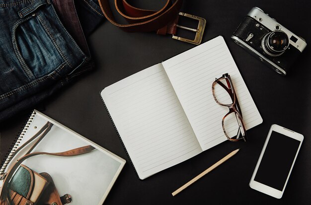 mockup tourist set, jeans, strap, camera, glasses, scratchpad and smartphone