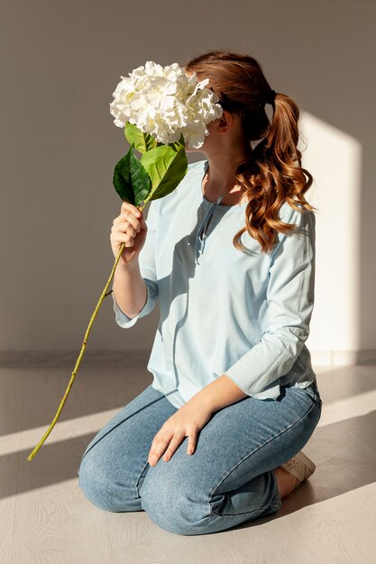 Model holding big flower