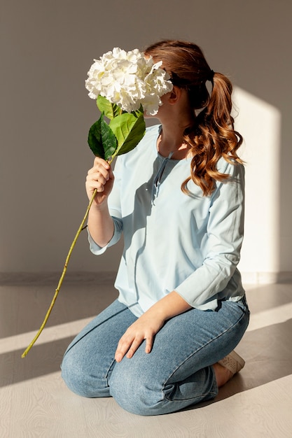 Model holding big flower