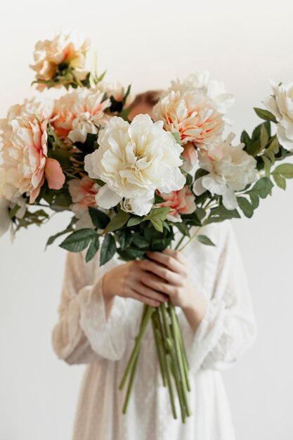 Model holding lovely flower bouquet