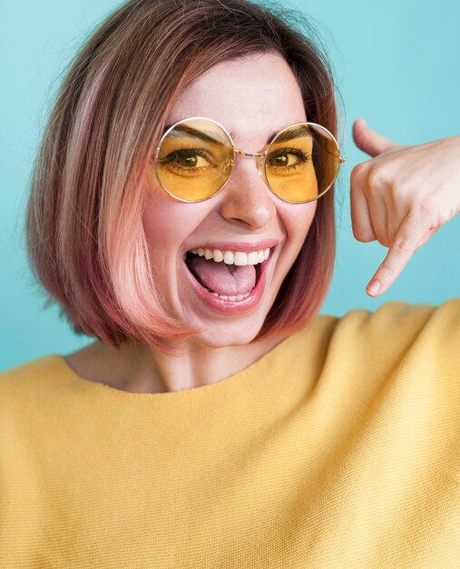 Model making phone call hand gesture