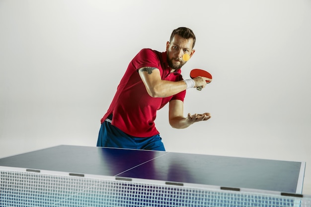 Model plays ping pong. Concept of leisure activity, sport, human emotions in gameplay, healthy lifestyle, motion, action, movement.