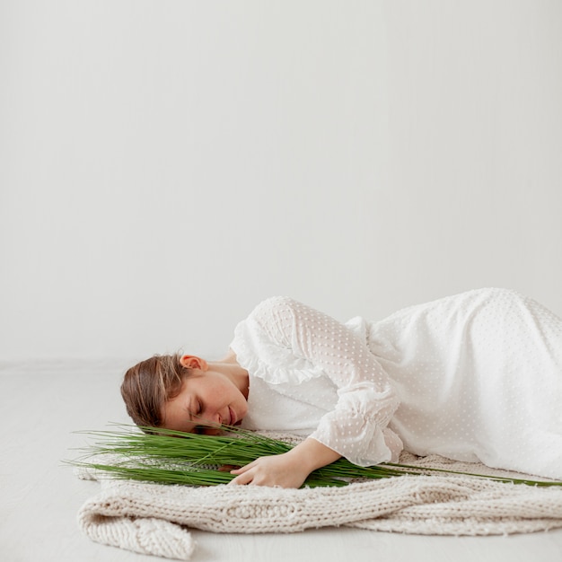 Free photo model posing with plant copy space