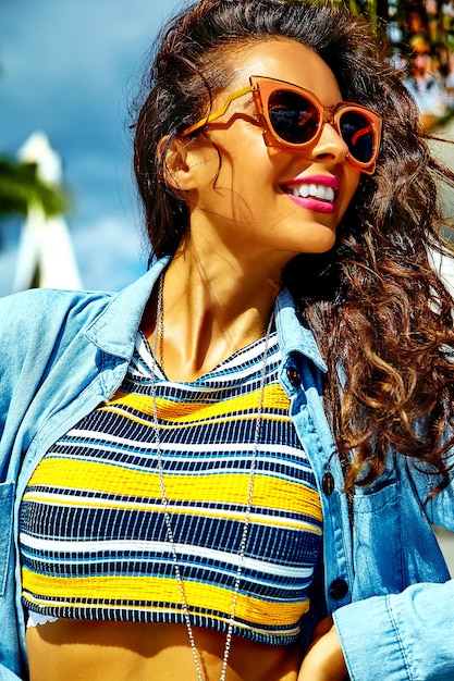 model in summer  hipster clothes posing in the street