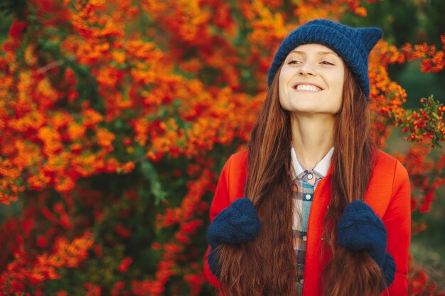 Model wearing stylish winter beanie hat and gloves