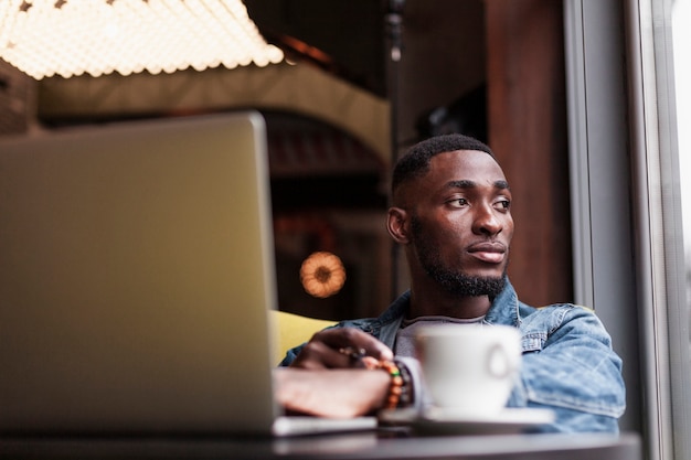 Modern afroamerican man looking away