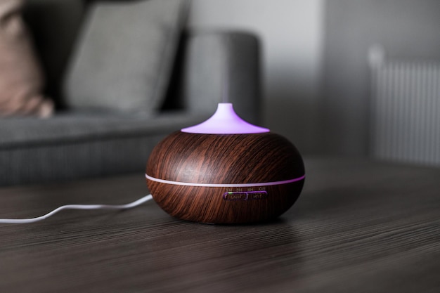 Modern air humidifier on table