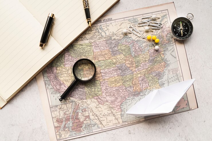 Free Photo modern arrangement of travel map and accessories
