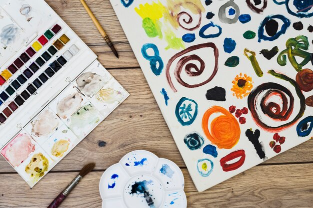 Modern artist concept with brushes and colorful paint