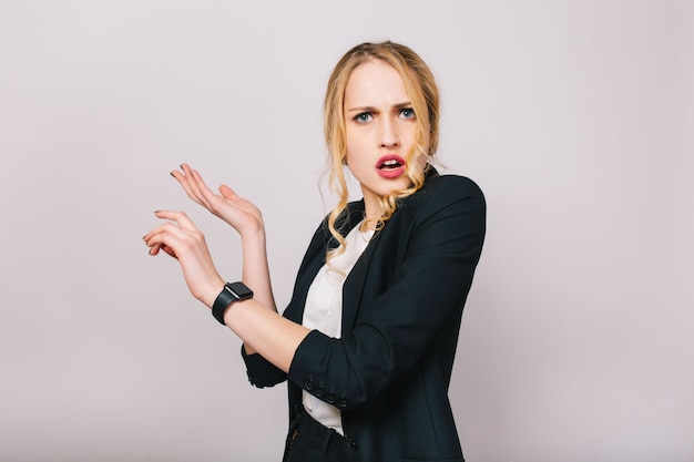 Modern attractive blonde office woman in white shirt and black jacket looking isolated. Astonished, worker, busy, businesswoman, meeting