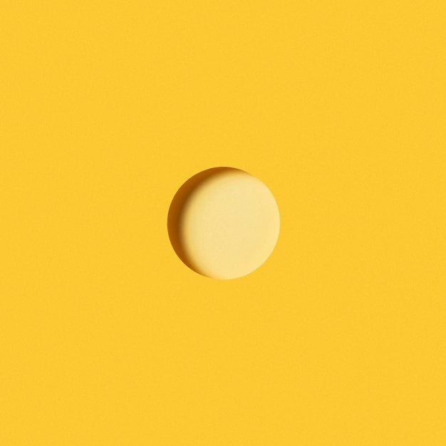 Modern background with light yellow circular piece of paper