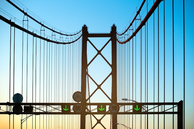 Free photo modern bridge with road signs and traffic lights