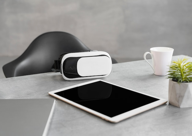 Modern business desk with virtual reality headset