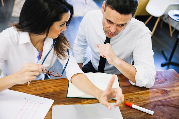 Modern business people at table