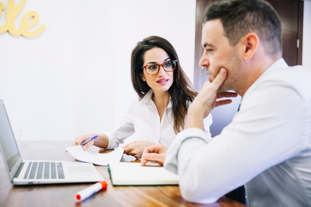 Modern business people working in office