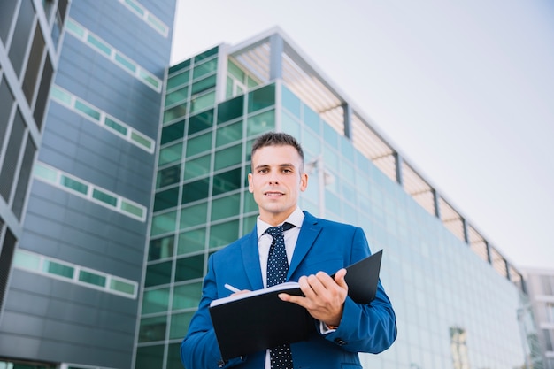 Modern businessman with folder