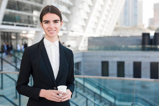 Modern businesswoman outdoors