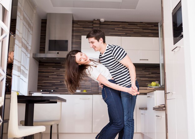 Modern couple in kitchen